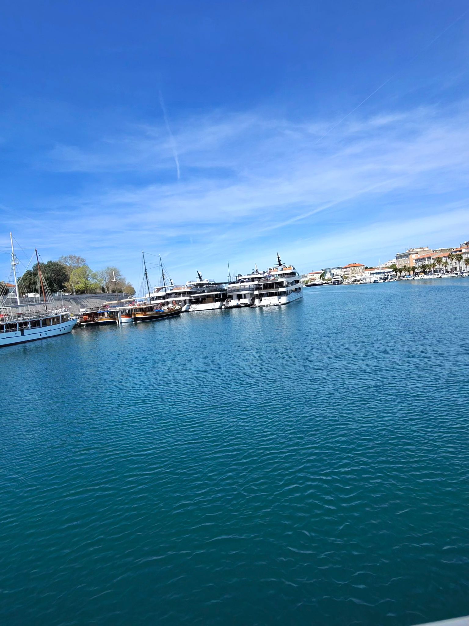 Pula harbor sunset boat excursion along the coastline
